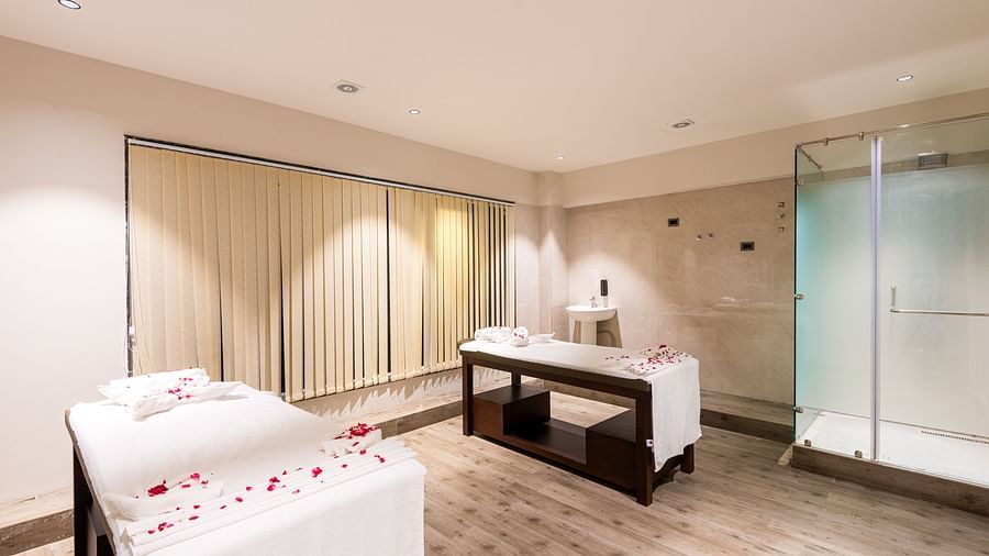 Spa at DLS Divine River Resort and Spa with spa beds and warm lighting